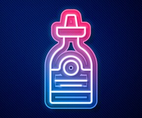 Glowing neon line Tequila bottle icon isolated on blue background. Mexican alcohol drink. Vector