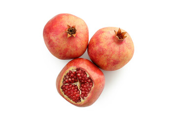 Ripe pomegranate fruits isolated on white background