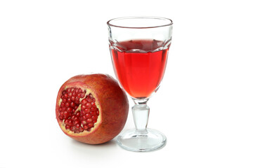 Glass of pomegranate juice and ingredient isolated on white background