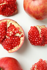 Ripe pomegranate on white background, top view