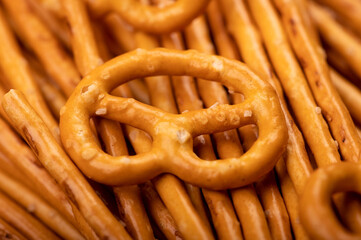Bread sticks and bread figures with salt. Close-up Background image.
