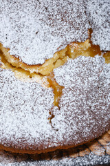 Fresh muffin cake decorated icing sugar, top view. Selective focus
