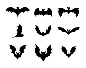 Obraz na płótnie Canvas Set of black silhouettes of bats. Creepy decoration of horror design for Halloween party. Spooky background for october night party and invitations. Flat vector stock illustration.