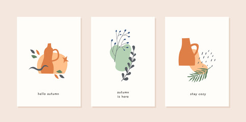 Fototapeta premium Set of autumn mood abstract greeting card templates with vases, plants, leaf, berries and geometric shapes. Trendy poster. Fall season nature minimal wall art. Vector illustration flat freehand style.
