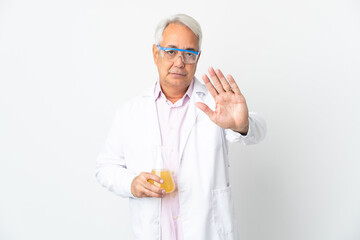 Middle age Brazilian scientific man scientific isolated on white background making stop gesture