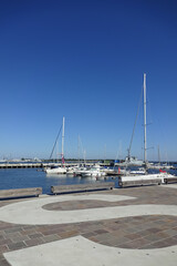 Seaview in Noblessner. Yachts and sailing boats on the dock. A sunny summer day with a clear blue sky. Tallinn, Estonia