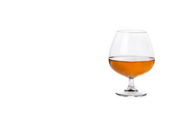 Cognac or whiskey drink isolated on white background. Copy space