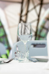 Wedding. Banquet. Table for guests, are served with cutlery and crockery and covered with a tablecloth.