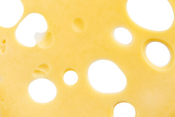 Cheese texture. Background of fresh yellow cheese with holes