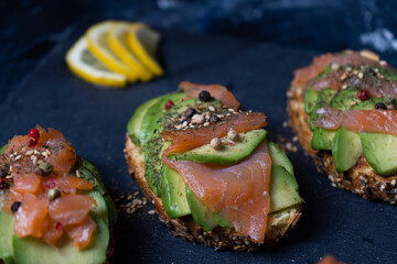 Avocado Toast with salmon, lemon and pepper