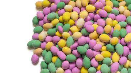 Group of colorful peanuts in glaze.
