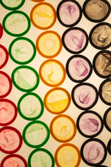 Colorful condoms background.