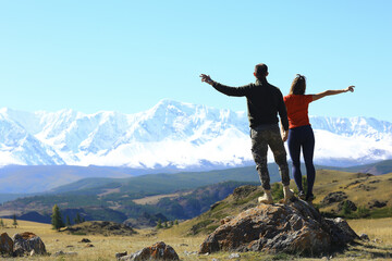 couple hands up mountains, landscape adventure active view