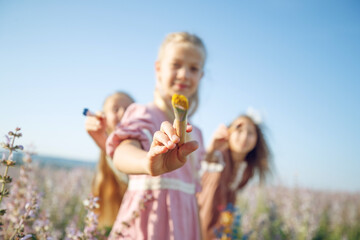 Fototapeta premium Children paint with paints in nature. High quality photo