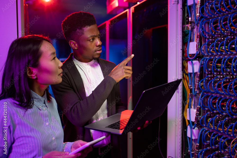 Poster multi-ethnic colleagues working together at data center