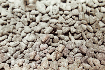 Many heart-shaped candied sweets.