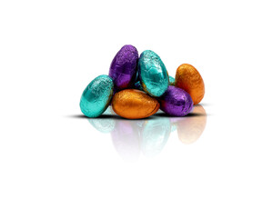 Fototapeta na wymiar Chocolate and Easter eggs in colorful foil on white background with clipping path