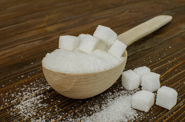 Sugar wooden spoon on the table