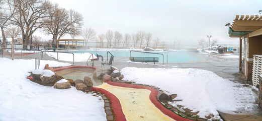 Small and large outdoor pools in the middle of snow