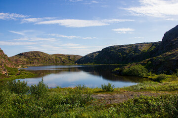 Landscapes of the Murmansk region. Road to and from the fortification of the coastal defense battery, Teriberka, Russia.