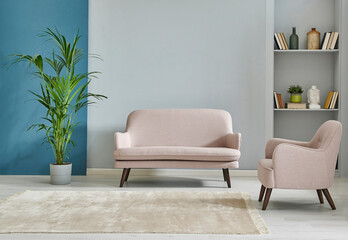 Grey and blue living room style, modern small sofa, carpet parquet floor, vase of green plant and...