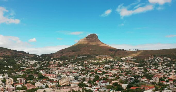 Hyperlapse. Aerial view flying towards the city of Cape Town with Table Mountain.