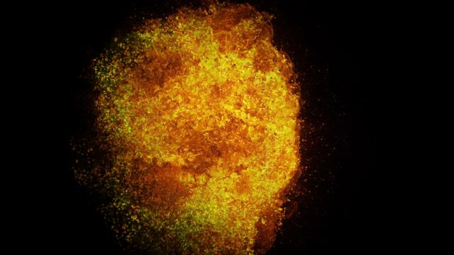 Colorful explosion of fiery particles in slow motion. Bright colors and fiery color transitions during the blast wave. This video can be used as a colorful background for any video