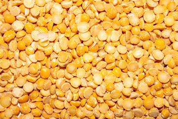 Pea split background.The texture of crushed peas.