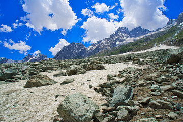 Beautiful mountain scenery. Blue sky, yellow glaciers and rocks. In-depth trip on the Sonamarg Hill Trek in Jammu and Kashmir, India, June 2018