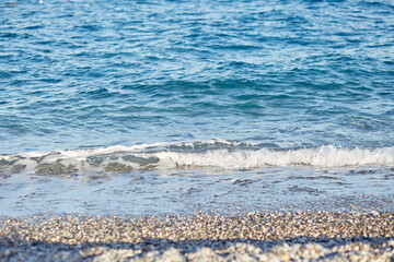 Clear blue water surface in sunny day, seamless pattern, texture. Natural background with bokeh lights. Summer vacations background