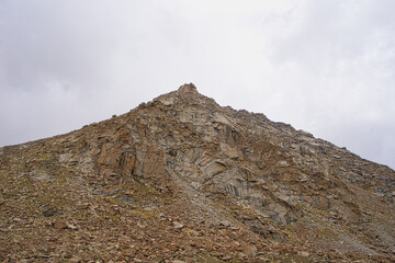 Pangong Tso or Pangong Lake is a marshland and wetland. Yellow Mountain.  Landscape an endorheic lake in the himalayas, Jammu and Kashmir, India. June 2018