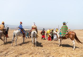 Horse and foot warriors - participants in the reconstruction of Horns of Hattin battle in 1187, are on the battle site, near TIberias, Israel
