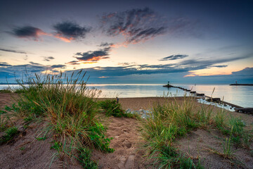 Fototapeta premium Beautiful sunset over the beach at Baltic Sea in Gdansk, Poland.