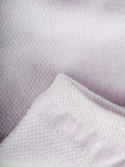 the edge of multi-colored socks, curved sleeves, several layers of fabric