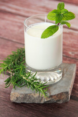 white milk kefir in a glass mug
