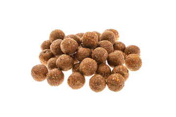 Close up view of brown boilies, fishing baits for carp isolated on white background