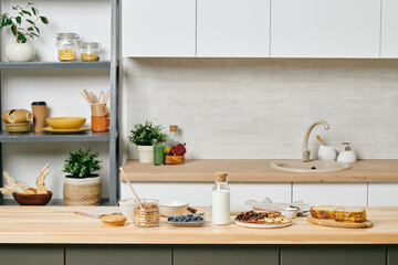 Group of ingredients for healthy vegetarian breakfast on kitchen table