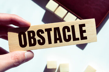 Wooden Blocks with the text: Obstacle