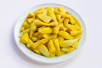Preserved bamboo shoot in white plate on white background.
