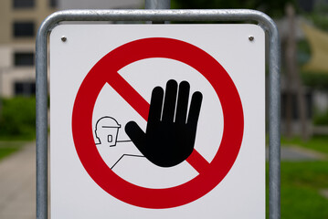 No trespassing sign at residential area of City of Zurich on a cloudy summer day. Photo taken July 12th, 2021, Zurich, Switzerland.