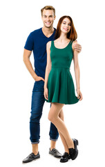 Image of smiling young couple. Full body length portrait of standing close and looking at camera models at happy in love studio concept, isolated on white background. Man and woman posing.