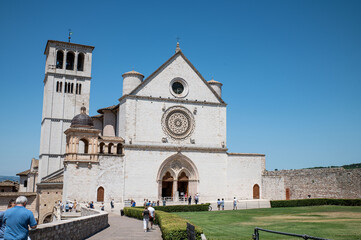 church of san francesco in assisi and its huge structure and its tourists
