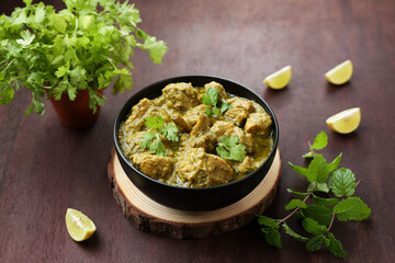 Green chicken Curry , Chicken Hariyali Tikka, Chicken Hara Masala , chicken hariyali Indian style. palak spinach Chicken or Murg Saagwala served in with coriander leaf,.Hyderabad India