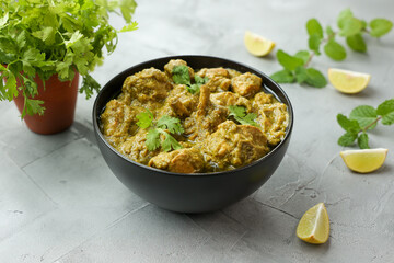 Green chicken Curry , Chicken Hariyali Tikka, Chicken Hara Masala , chicken hariyali Indian style. palak spinach Chicken or Murg Saagwala served in with coriander leaf,.Hyderabad India