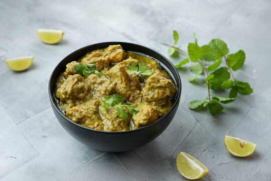 Green chicken Curry , Chicken Hariyali Tikka, Chicken Hara Masala , chicken hariyali Indian style. palak spinach Chicken or Murg Saagwala served in with coriander leaf,.Hyderabad India
