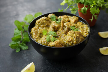 Green chicken Curry , Chicken Hariyali Tikka, Chicken Hara Masala , chicken hariyali Indian style. palak spinach Chicken or Murg Saagwala served in with coriander leaf,.Hyderabad India