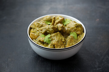 Green chicken Curry , Chicken Hariyali Tikka, Chicken Hara Masala , chicken hariyali Indian style. palak spinach Chicken or Murg Saagwala served in with coriander leaf,.Hyderabad India