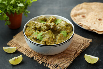 Green chicken Curry , Chicken Hariyali Tikka, Chicken Hara Masala , chicken hariyali Indian style. palak spinach Chicken or Murg Saagwala served in with coriander leaf,.Hyderabad India