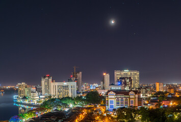 Naklejka premium the beauty and colorful city of kuching the capital of sarawak from different angles in the night atmosphere