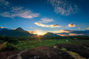 Dramatic clouds with sunset mountain background view.Near NAGERCOIL, KANYAKUMARI DISTRICT, TAMIL NADU. INDIA.